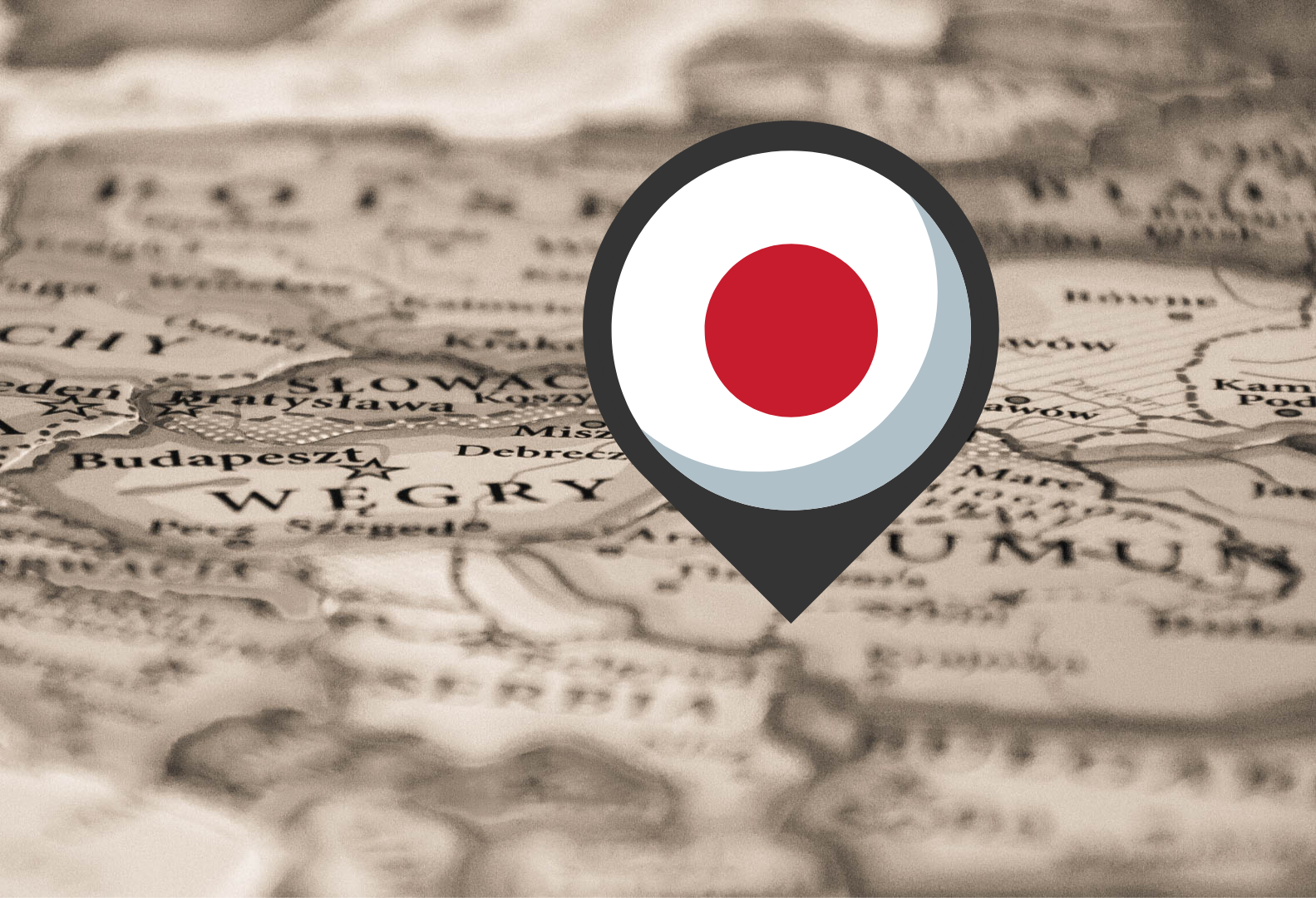 Pinezka z flagą Japonii wbita w mapę/A pushpin with the flag of Japan stuck in the map